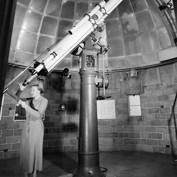 First Manager Dorothy Trotter and the Bausch 10.5-Inch Refractor (1956) Photo credit High Altitude Observatory Archives
