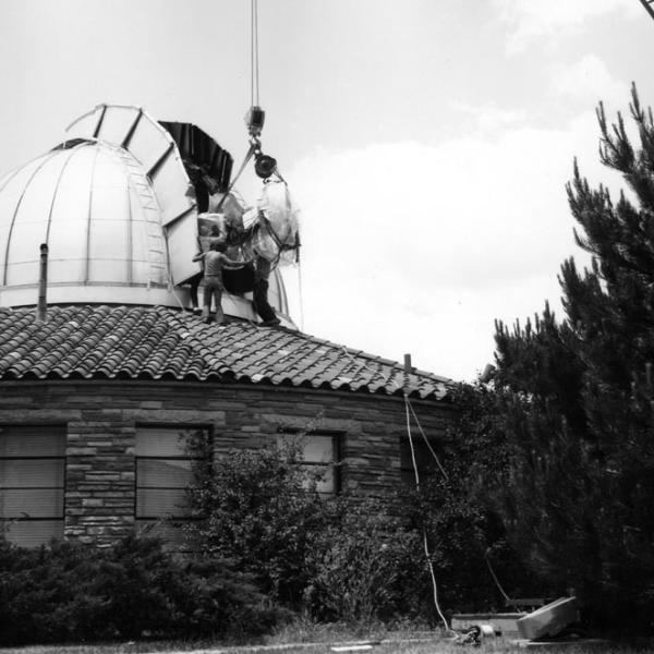Installing the 24-inch Pier through the Dome Slit (1973) Photo credit High Altitude Observatory Archives