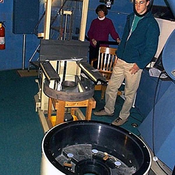 Removing the 24-inch Mirror (Remy Indebetouw and Director Katy Garmany) (1999) Photo credit Keith Gleason, Sommers-Bausch Observatory