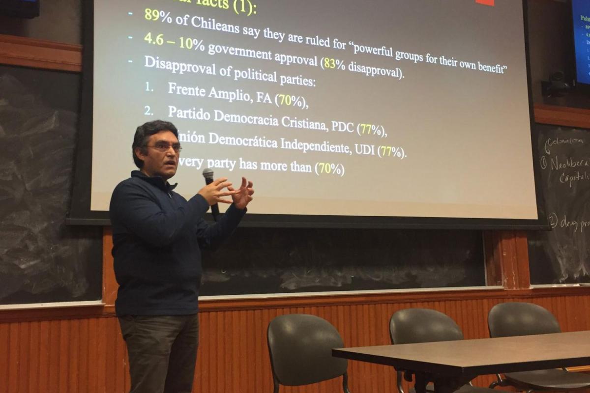 Professor showing power point presentation