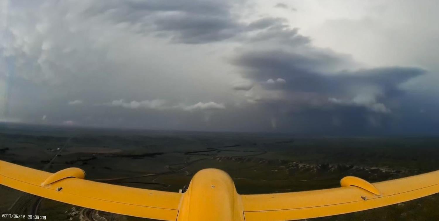 Project STORM team flies the IRISS TTwistor UAS toward a supercell with a tornado on the ground