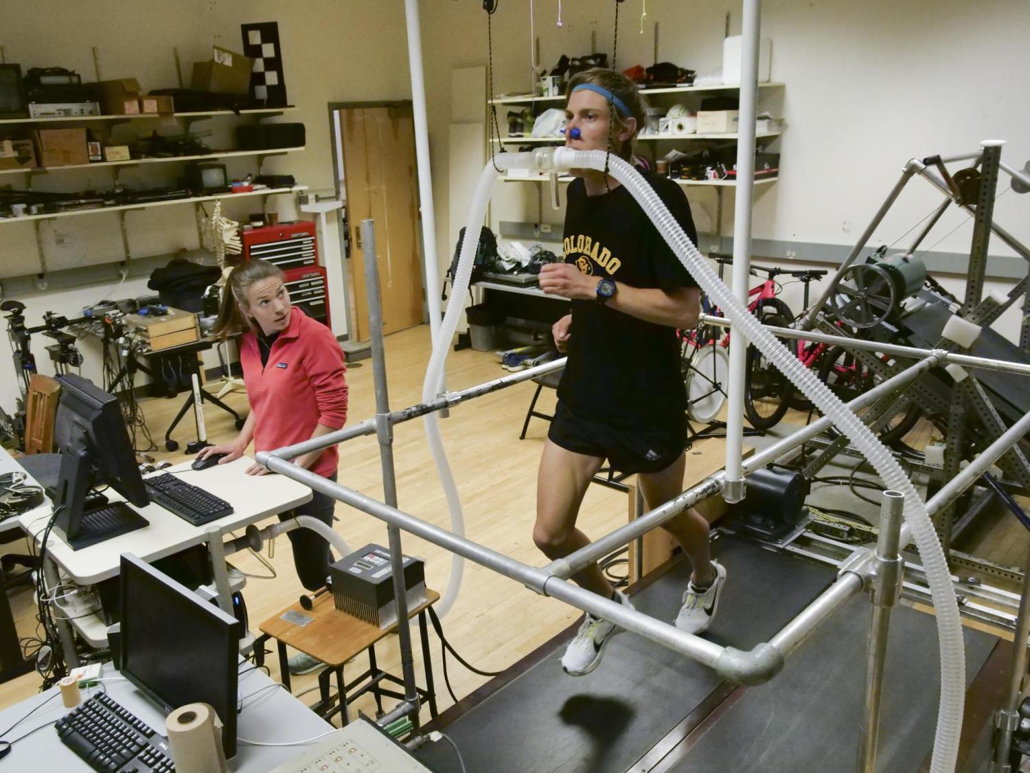 A runner tests the 4% on the treadmill at a CU lab