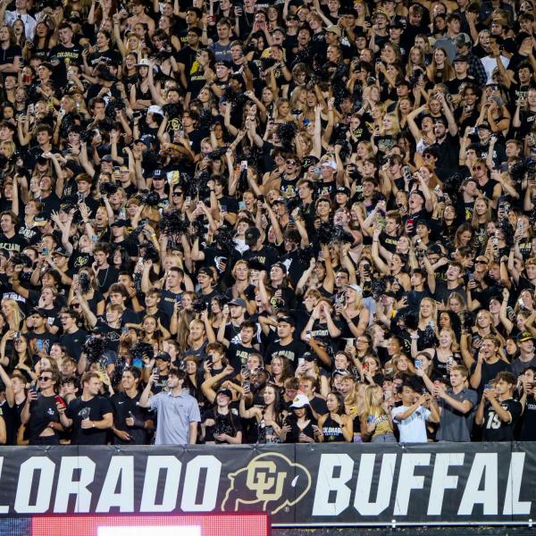 A crowd at Folsom Field during a football game