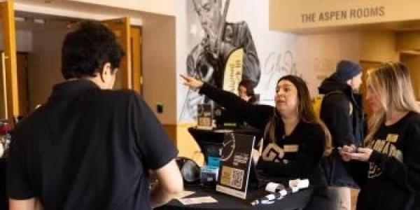 Students at front desk of Career Services