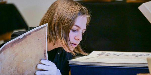 Student studying a book