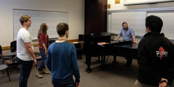 Faculty and students in music class