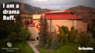 Humanities building with "I am a drama Buff"