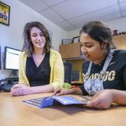 Student working with international admissions counselor