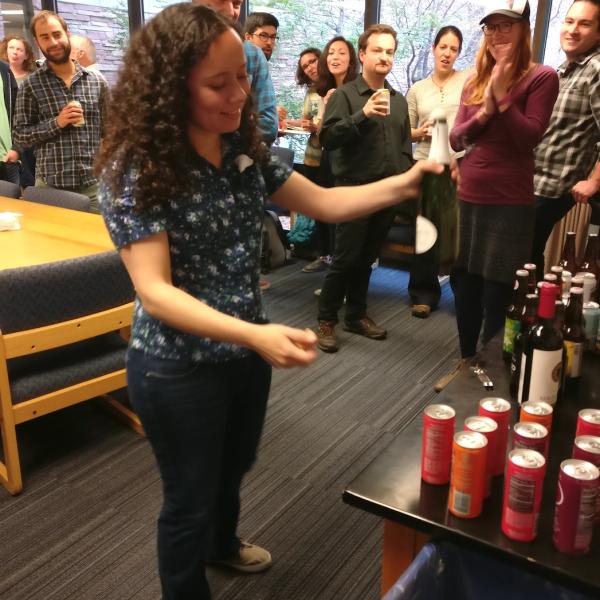 Julia popping the champagne after her exit talk, 2017