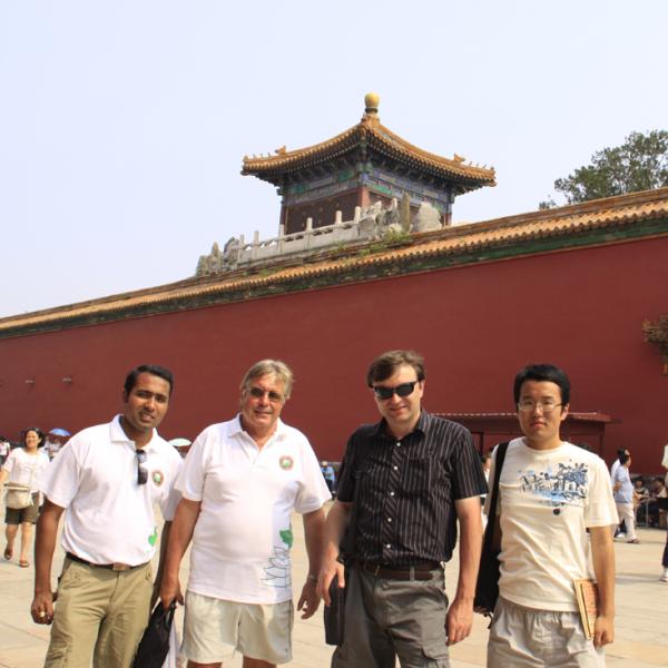 Rajdeep Deb, Harry Coles, Ivan Smalyukh and Qingkun Liu in the streets of Beijing during I-CAMP 2009 in China