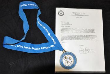 Donna's Medal and letter from the Army