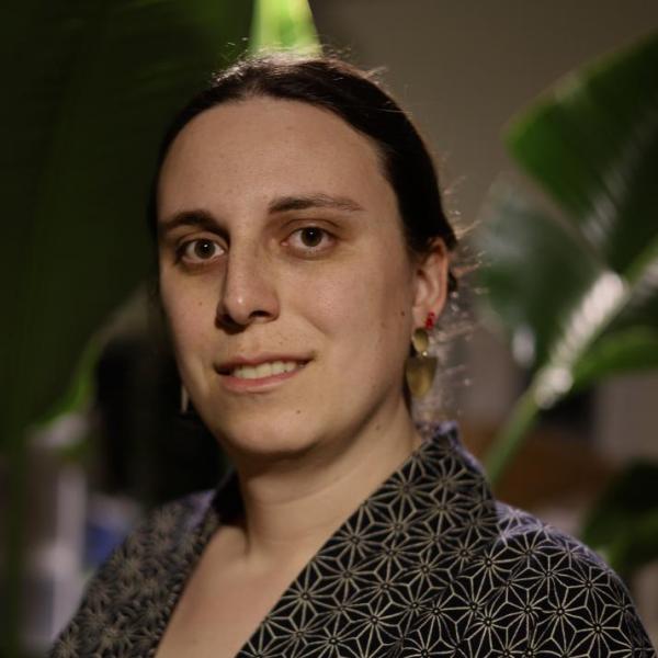 A square picture of Aisha Nammari, a white woman with pulled back brown hair.