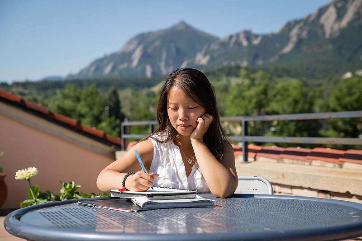 Student at table outside