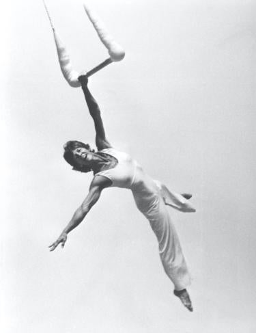 Terry Sendgraff on a trapeze 