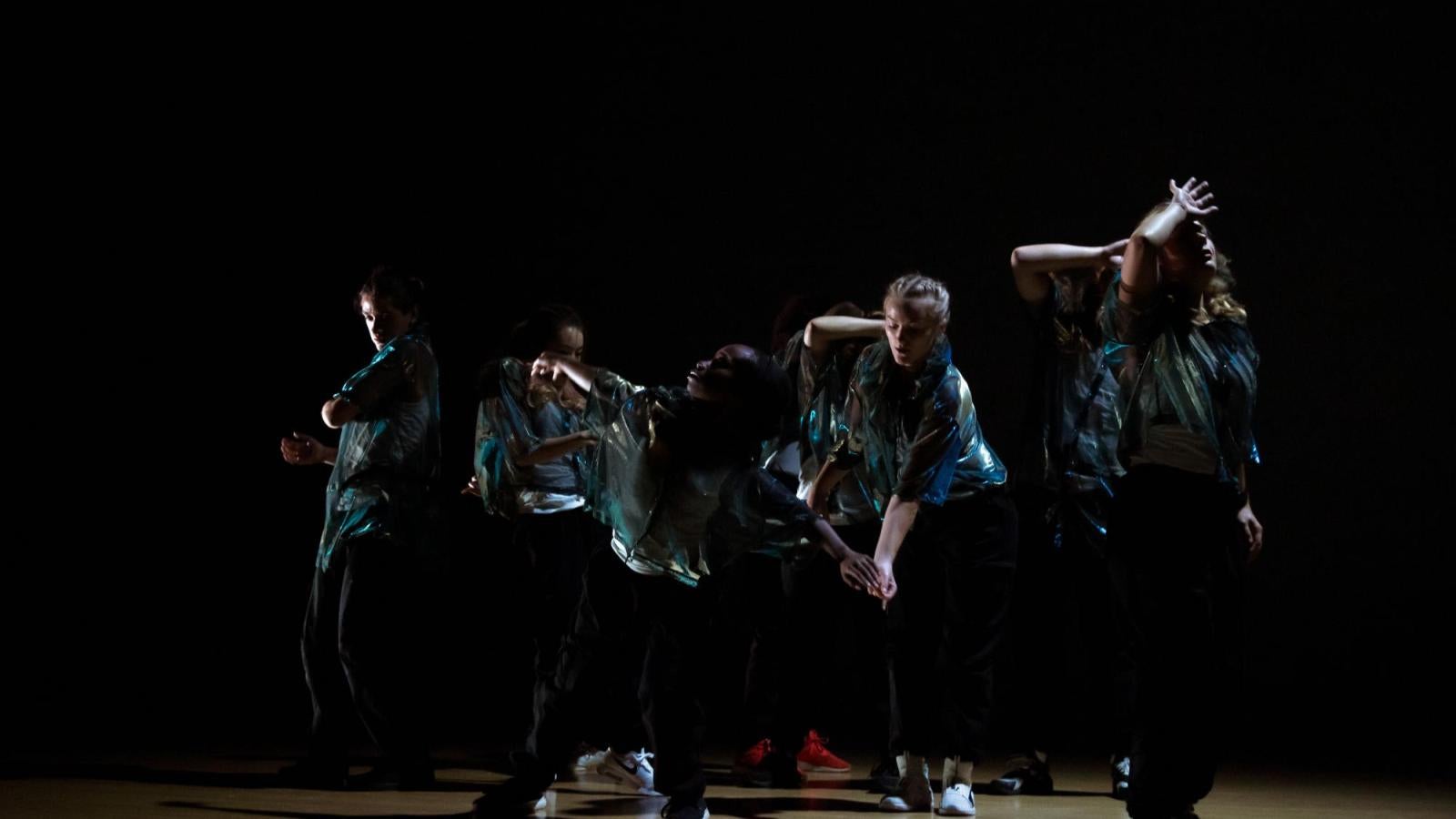 several students perform a hip-hop piece