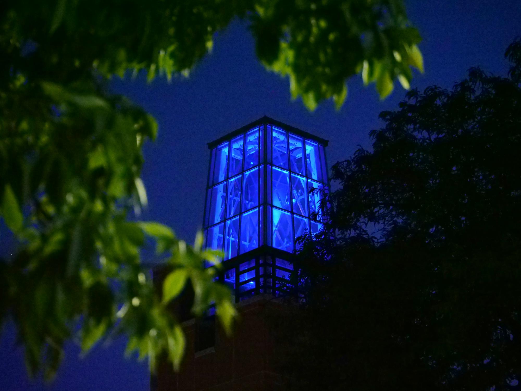 The ATLAS tower shines blue in remembrance (Photo by Casey Cass/University of Colorado)