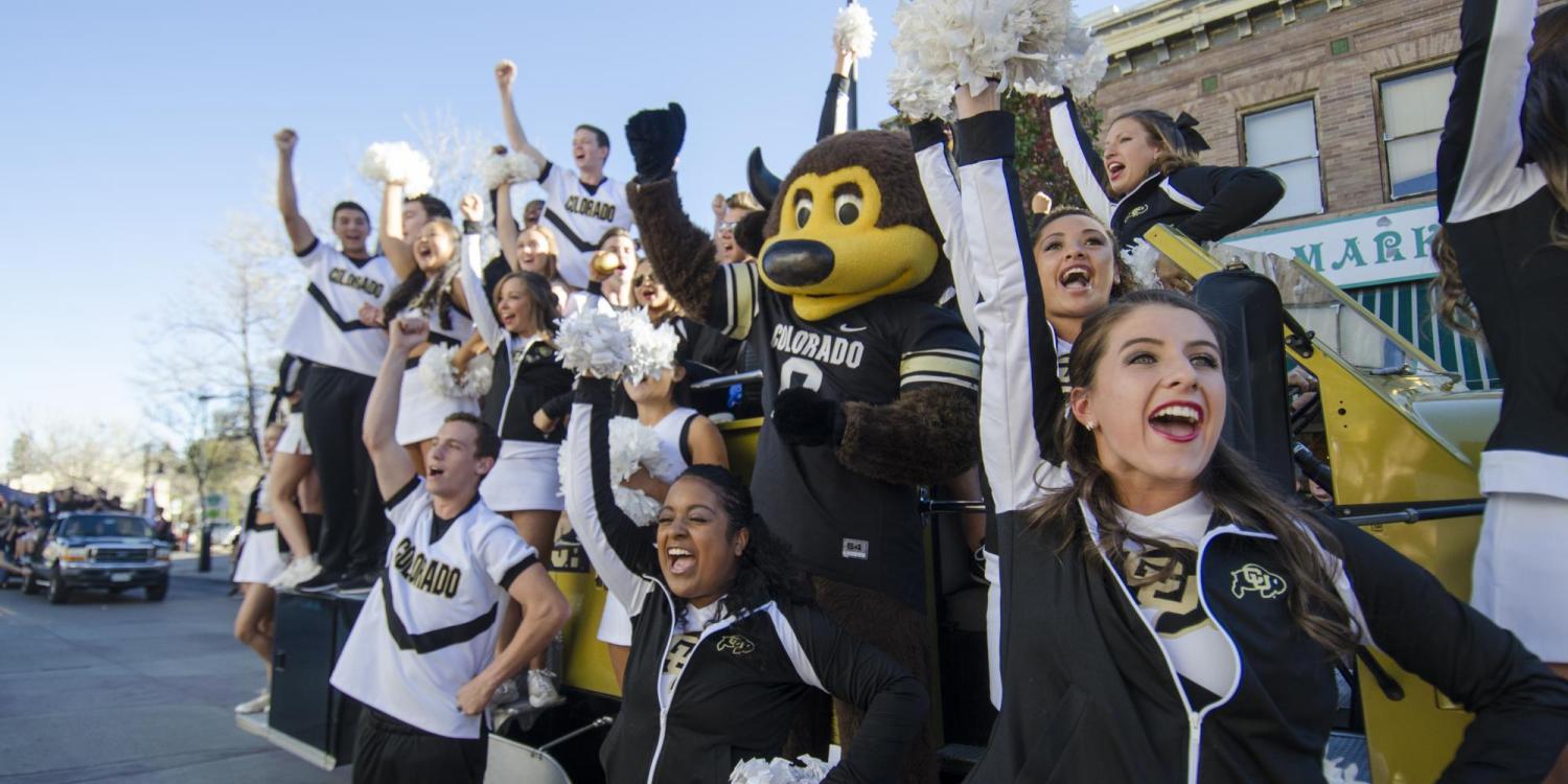 Chip and CU cheerleaders root for the Buffs