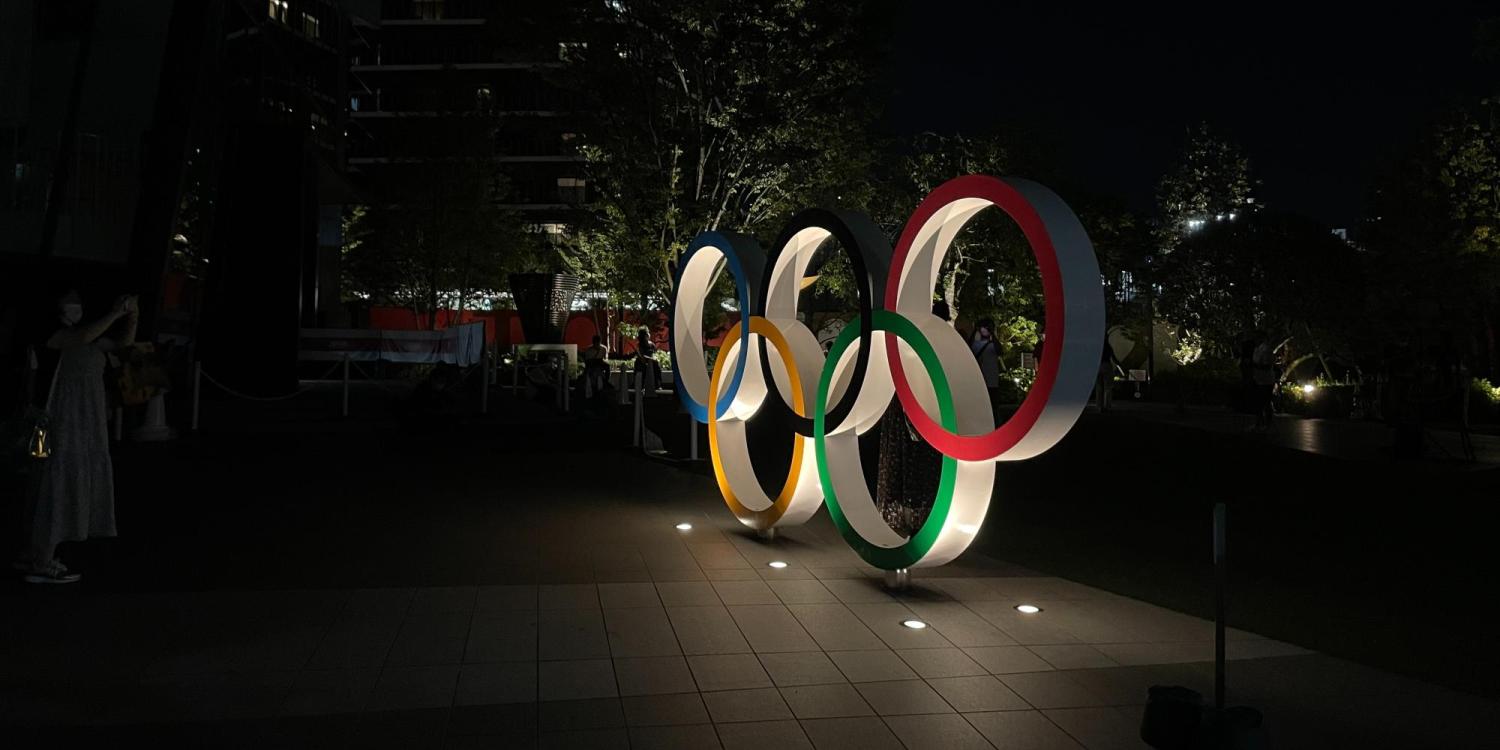 Olympic rings lit up at night