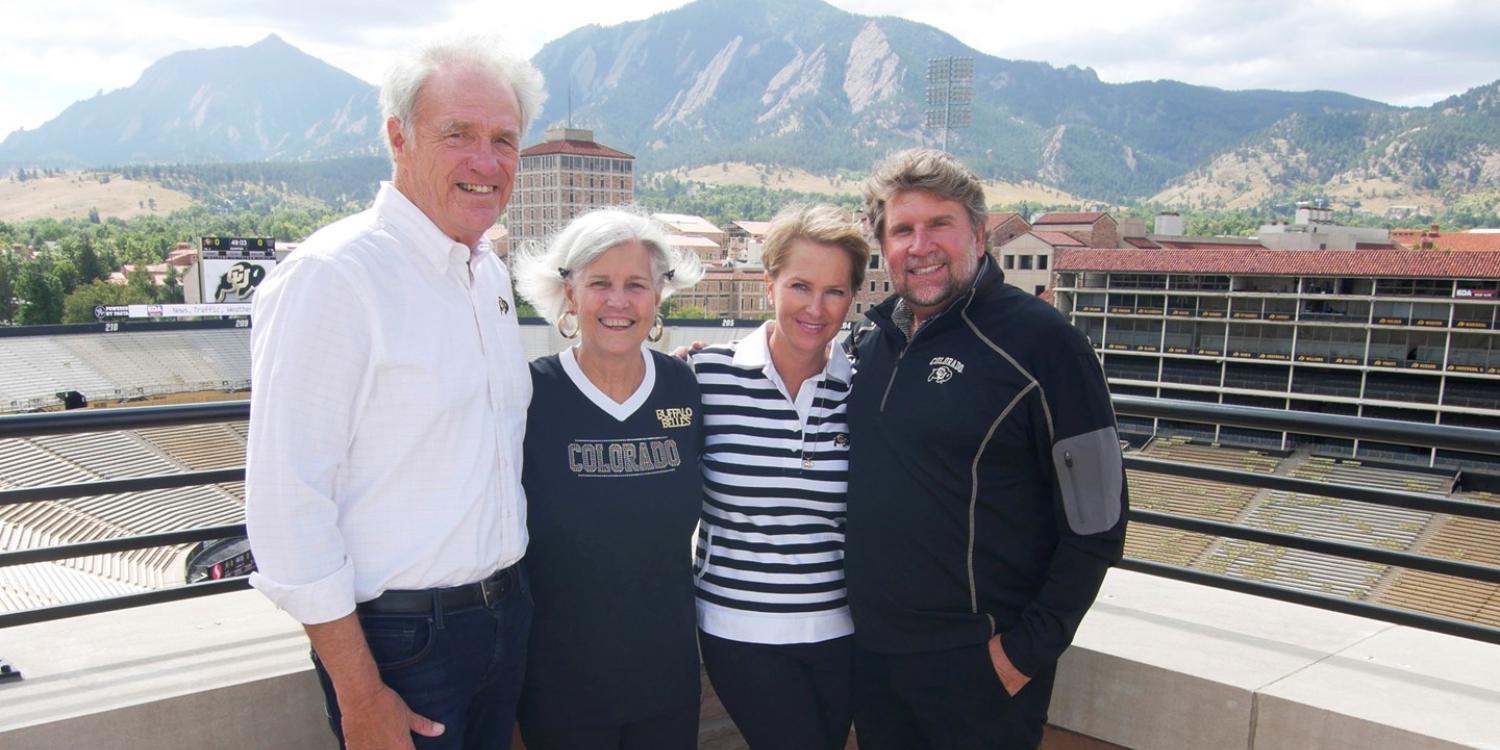 Lee Snyder, Char Snyder, Teri Trafton and Charlie Trafton at Folsom Field, where their story began