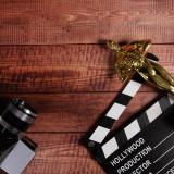 Academy Award trophy, camera and film clap board