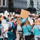 political protestors march on street