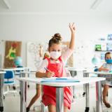 elementary students wearing masks in classroom