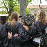 students celebrating graduation