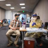 Student receiving vaccine.