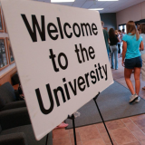 Welcome to the university sign.