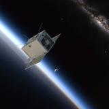 Artist's depiction of the SPRITE CubeSat orbiting Earth.