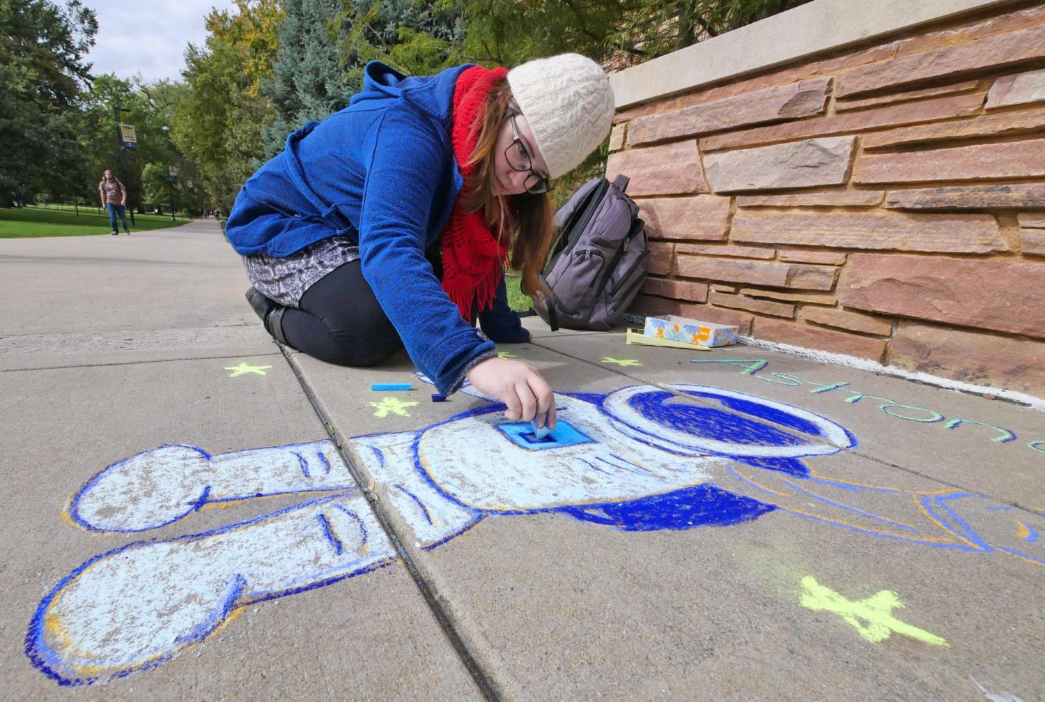 Shaylah Wood, senior electrical and computer engineering major, participates in the UROP Sidewalk Symposium. Photo by Casey A. Cass.