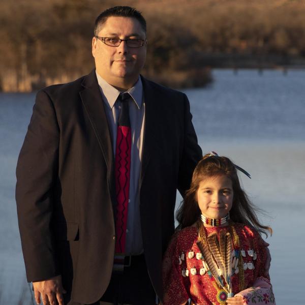 Justin Boos and his 9-year-old daughter dressed in traditional Native American clothing