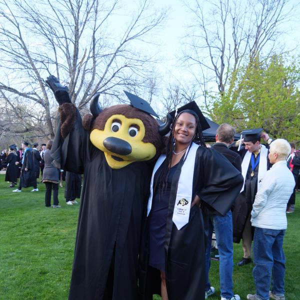 Students and faculty gather on the quad before processing to Folsom Stadium