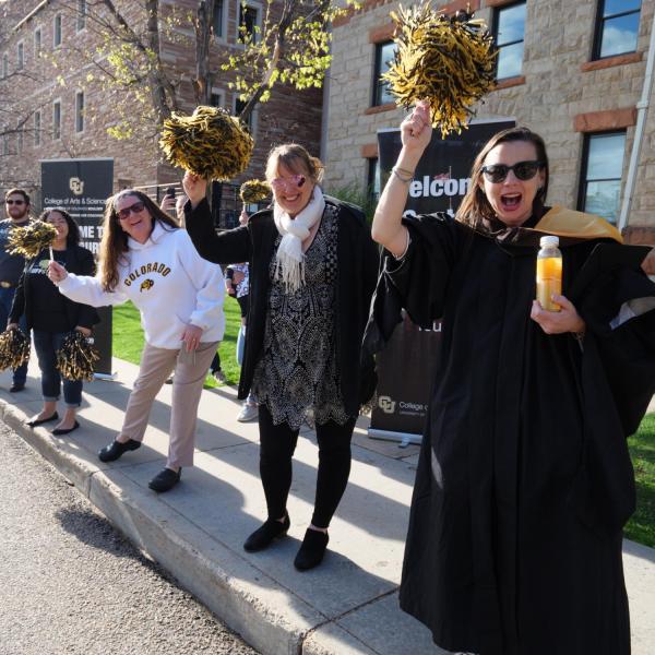 Commencement procession from Norlin Quad to Folsom Stadium