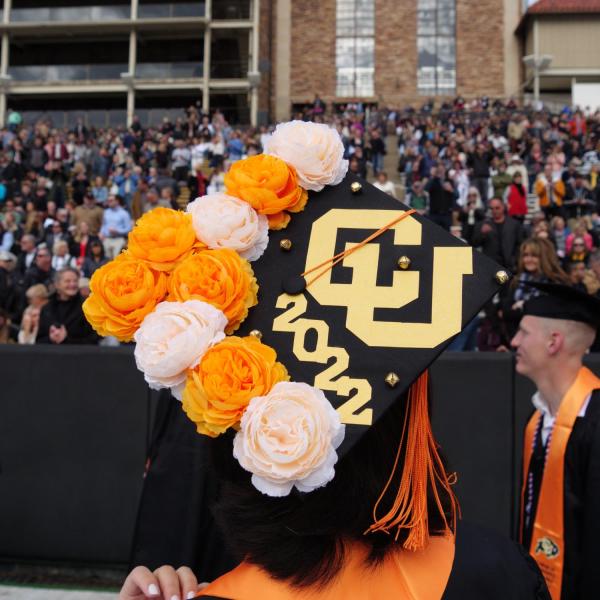 Commencement procession from Norlin Quad to Folsom Stadium