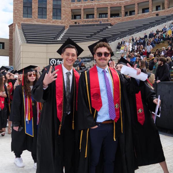 Commencement procession from Norlin Quad to Folsom Stadium