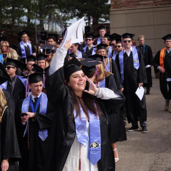 Commencement procession from Norlin Quad to Folsom Stadium