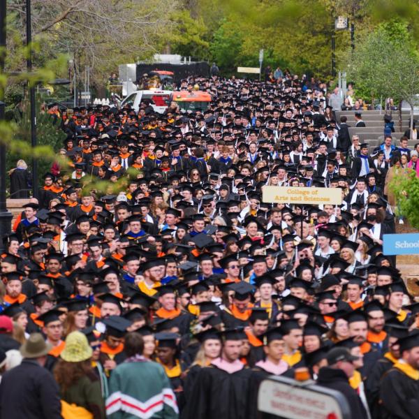 Graduates process to Folsom Field