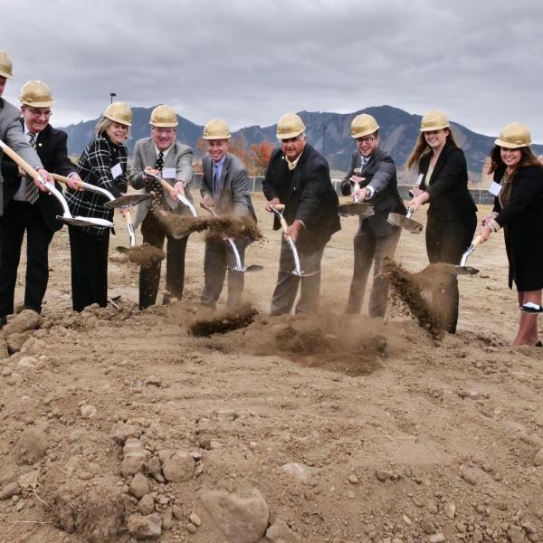 Left to right: Jay Lindell, Philip DiStefano, Ann Smead, Michael Byram, Bobby Braun, Glen Gallegos, Jack Kroll, Alexis Wall, Kathy Tobey and Brian Argrow shovel dirt at the Aerospace Engineering Science Building groundbreaking ceremony on CU Boulder's East Campus
