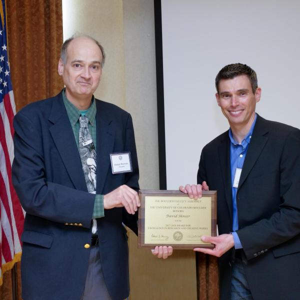 Research, Scholarly and Creative Work Award Selection Committee Chair Alastair Norcross and recipient David Shneer