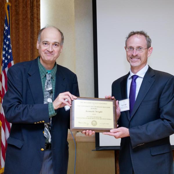 Research, Scholarly and Creative Work Award Selection Committee Chair Alastair Norcross and recipient Kenneth Wright