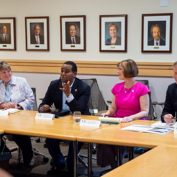 Rep. Joe Neguse (second from left) discusses a topic as Terri Fiez (left), Rep. Kathy Castor (second from right) and Rep. Sean Casten listen in. (Photo by Patrick Campbell/University of Colorado)