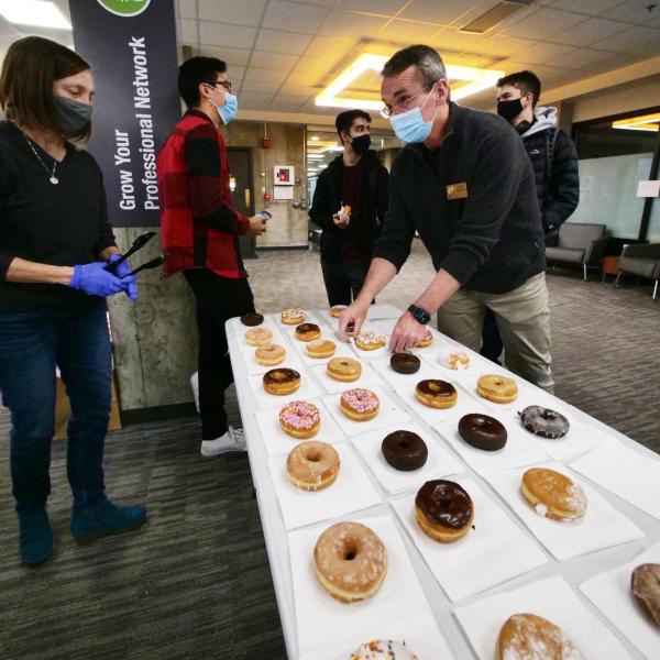 Donuts with the engineering dean, Keith Molenaar. Photo by Casey A. Cass.