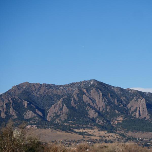 Flatirons the day after Halloween, no snow and clear blue skies. Photo by Glenn Asakawa.