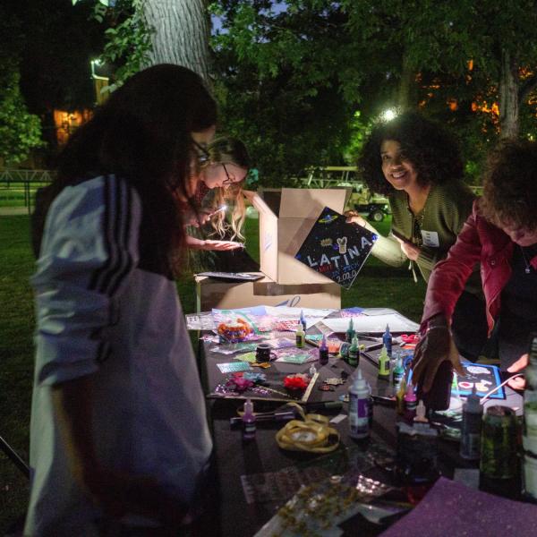 Graduates from the class of 2020 and 2021 gather for a celebratory evening at the Night on Norlin event on Sept. 17, 2021. (Photo by Glenn Asakawa/University of Colorado)