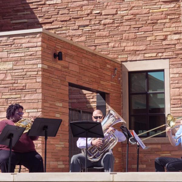 A brass ensemble performs during the official ribbon-cutting and opening ceremony of the Warner Imig Music building expansion on the CU Boulder campus on Sept. 17, 2021. (Photo by Glenn Asakawa/University of Colorado)