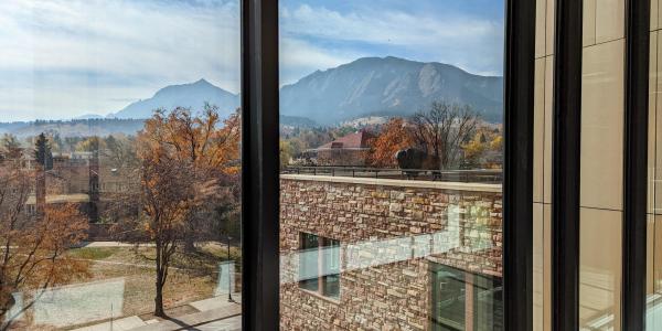 view campus and the Flatirons from inside a building