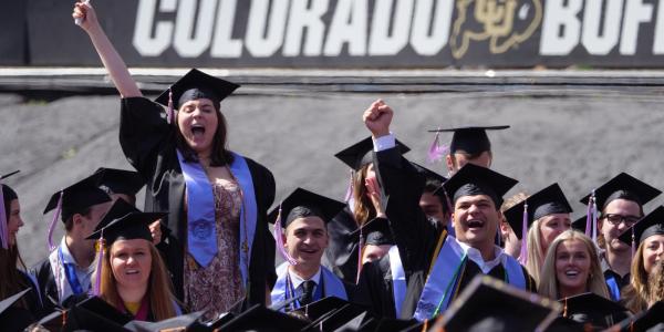 2022 graduates celebrate during the commencement ceremony