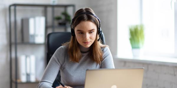 young person taking a webinar