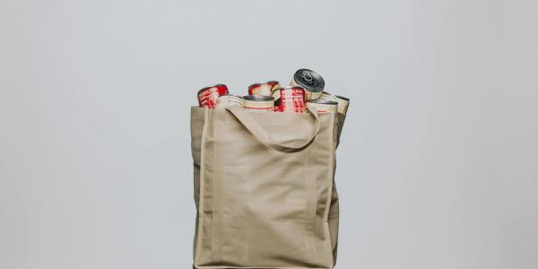 A canvas bag of canned goods.
